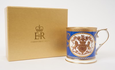 Lot 155 - H.M.Queen Elizabeth II 2013 Royal Household Christmas present, bone china tankard decorated with Royal Arms and 'Presented by Her Majesty The Queen' with presentation card in fitted box with Royal...