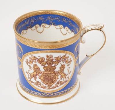 Lot 155 - H.M.Queen Elizabeth II 2013 Royal Household Christmas present, bone china tankard decorated with Royal Arms and 'Presented by Her Majesty The Queen' with presentation card in fitted box with Royal...