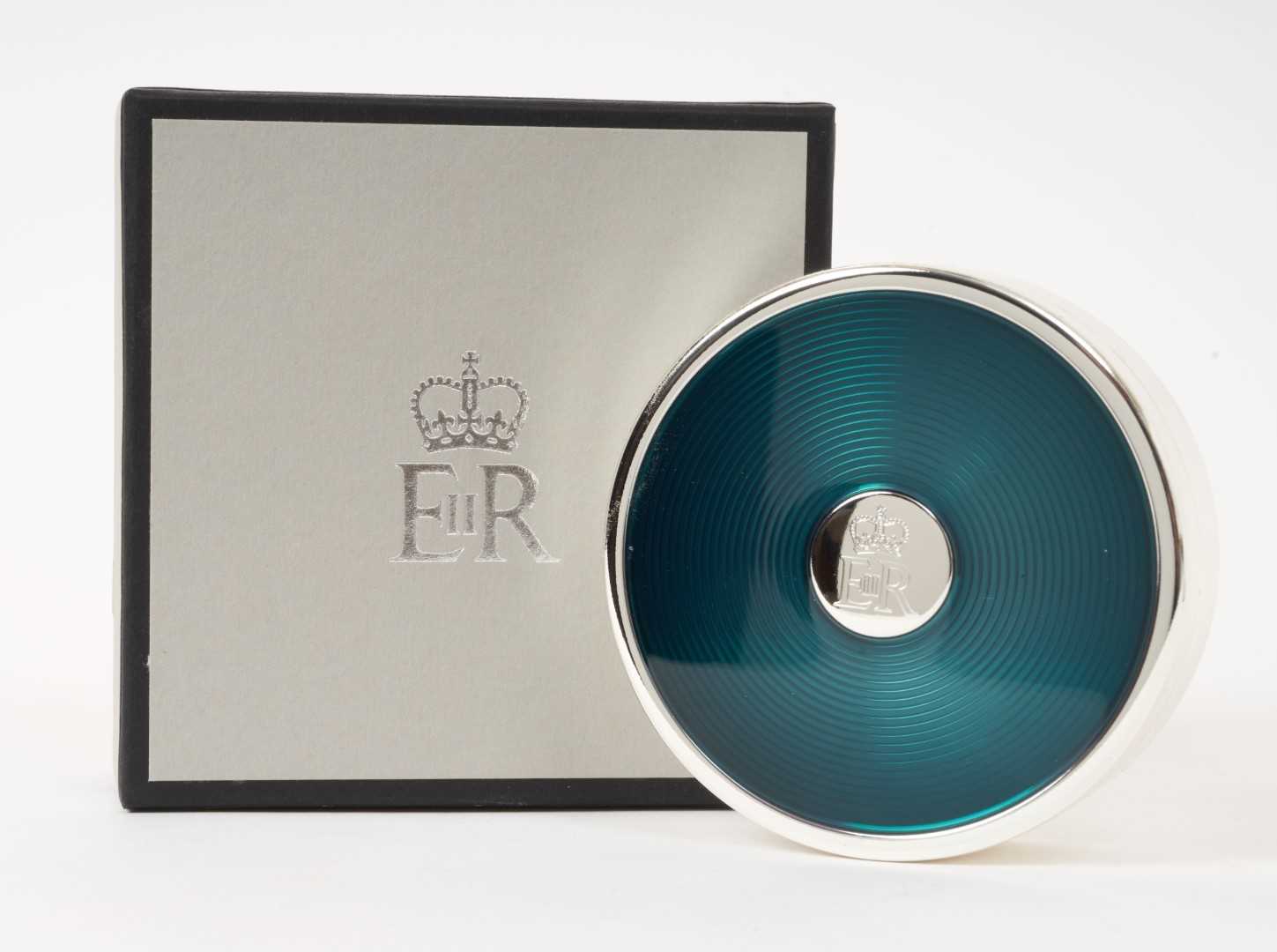 Lot 156 - H.M.Queen Elizabeth II 2014 Royal Household Christmas present, silver plated and green enamel circular trinket box with crowned ERII cipher to centre, velvet lined interior, 7.6cm diameter in cotto...