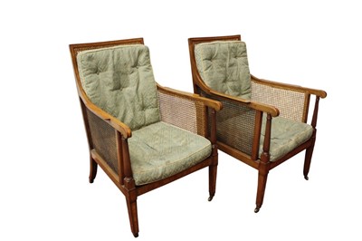 Lot 1518 - Fine pair of 19th century mahogany and satinwood crossbanded bergère chairs, raised on square tapered legs and castors, stencil number to frame