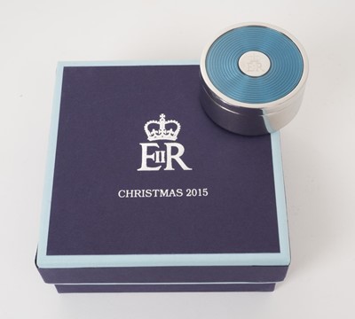 Lot 157 - H.M.Queen Elizabeth II 2015 Royal Household Christmas present, silver plated and enamelled travelling alarm clock with crowned ERII cipher to centre 4.8 cm diameter, quartz movement with operating...