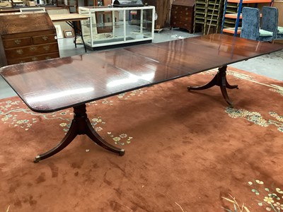 Lot 1524 - Good quality George III style mahogany twin pedestal dining table with three extra leaves