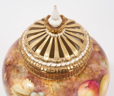 Lot 383 - A Royal Worcester pot pourri with pierced cover, hand painted with fruit and signed T. Nutt