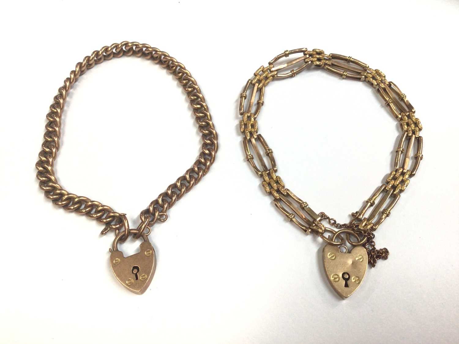 Lot 41 - Two 9ct gold bracelets, both with padlock clasps