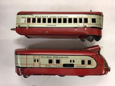 Lot 165 - Electric Streamlined Train set in original box with locomotive, three coaches and track set made in England, Engine made in USA