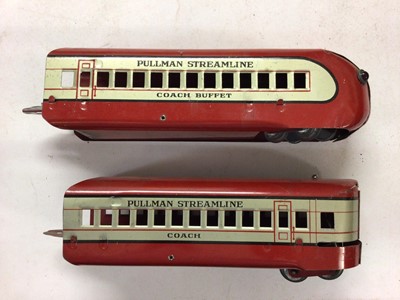 Lot 165 - Electric Streamlined Train set in original box with locomotive, three coaches and track set made in England, Engine made in USA