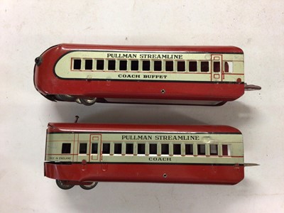 Lot 165 - Electric Streamlined Train set in original box with locomotive, three coaches and track set made in England, Engine made in USA