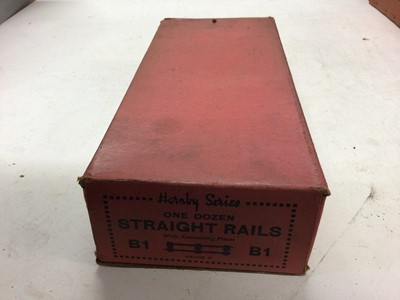Lot 168 - Hornby O gauge boxed selection including Flat Truck with container RS713, Barrel Wagon RS691, No.1 level crossing A812, various straight rails B1, Points, Parallel Points etc (qty)