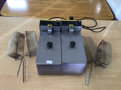 Lot 45 - Buffalo stainless steel twin table top deep fat fryer, cables and plugs, Buffalo GK641 commercial microwave oven, cable and plug and Plus Zap insect killer, cable and plug