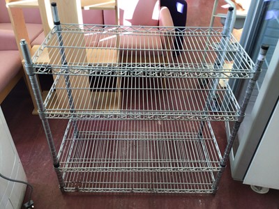 Lot 46 - A four tier wire framed shelf unit, 900 mm, plus tubular metal framed cutlery trolley, on castors