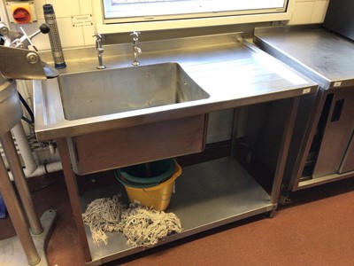 Lot 63 - A Moffat stainless steel single bowl sink unit, with two taps and shelf under, 1200 mm