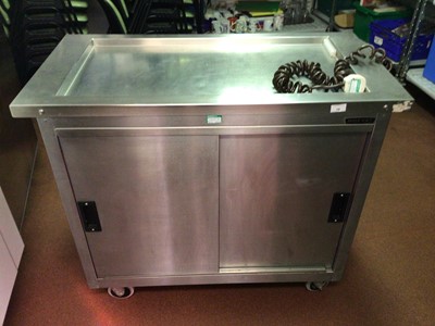 Lot 78 - A Moffat freestanding stainless steel electric hot cabinet, with twin sliding doors, on castors, 1010 mm