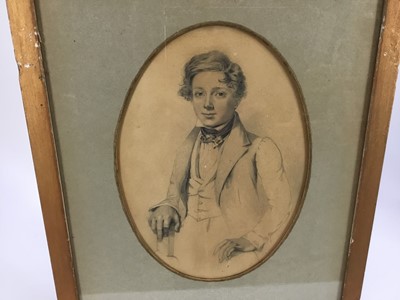 Lot 46 - Manner of Sir George Richmond pencil on paper - Portrait of a young man of the 1820's, in oval mount in glazed gilt frame (30cm x 39cm overall)