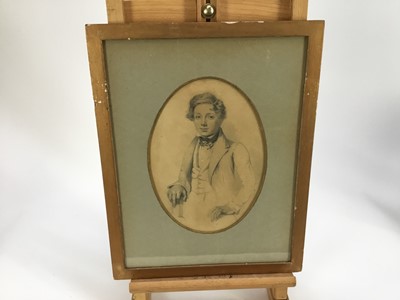 Lot 46 - Manner of Sir George Richmond pencil on paper - Portrait of a young man of the 1820's, in oval mount in glazed gilt frame (30cm x 39cm overall)