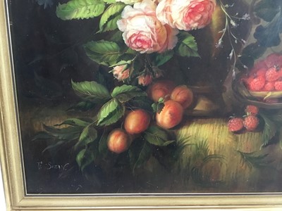 Lot 48 - F. Suzan, oil on wood board -  A still life with fruit, 51cm x 61cm in gilt frame