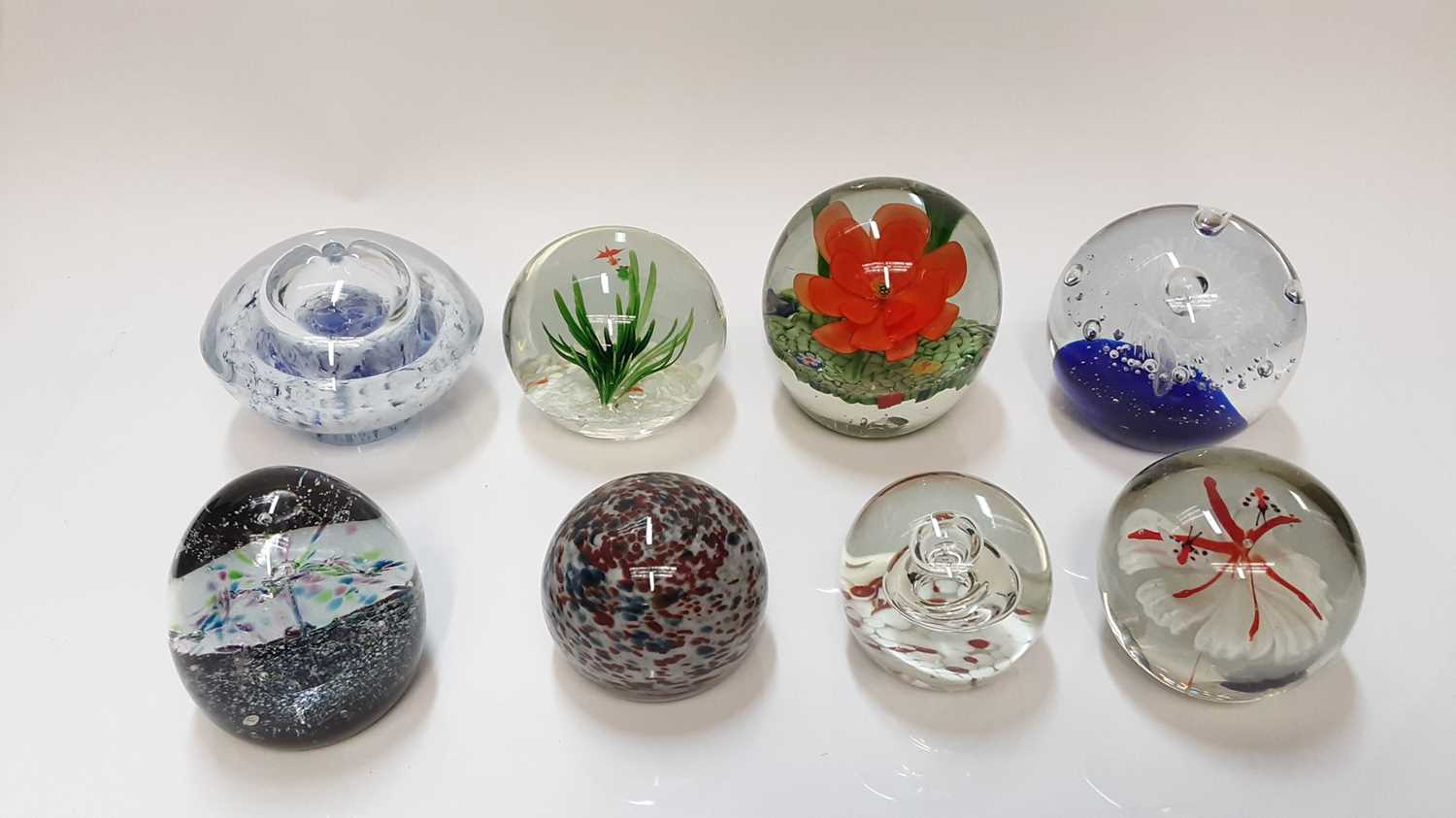 Lot 1261 - Eight various large paperweights