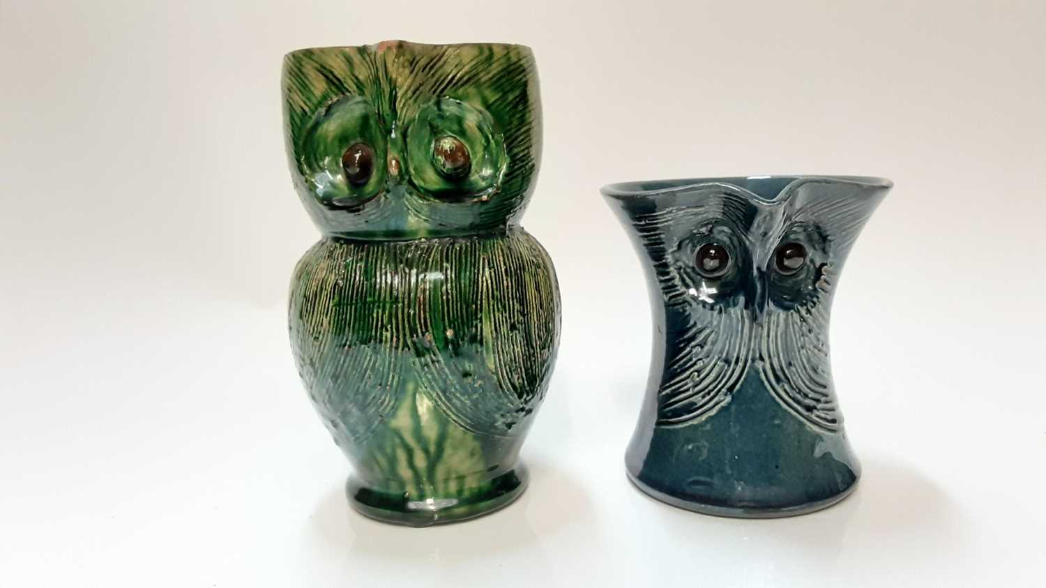 Lot 1283 - Farnham pottery green owl jug by Harris 17 cm and another blue owl jug 11cm (2)