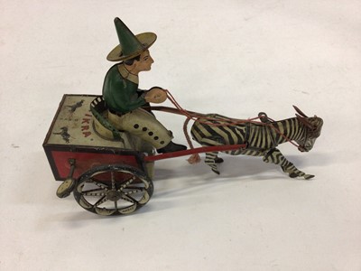 Lot 1831 - Selection of tinplate models including Lehmann Zikra Zebra cart, G & K horse-drawn cart, early automobile and paddle steamer
