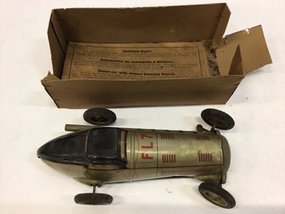 Lot 1832 - Tinplate motor car with distant steering device marked D.R.G.M,  Schuco tinplate clockwork car and four others (6)