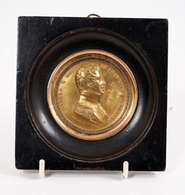 Lot 730 - 19th century gilt copper medallion depicting Charles X, in ebonised 
wood frame