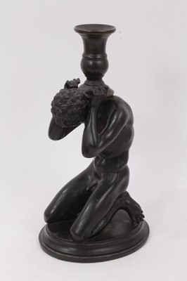 Lot 722 - Regency style plaster and bronze figural candlestick