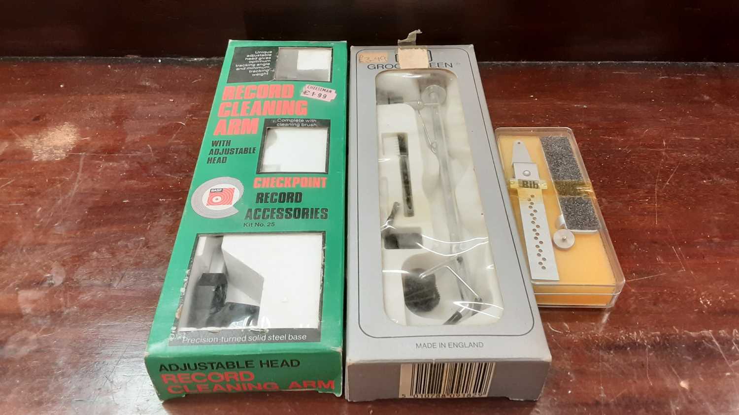 Lot 2237 - BASF record cleaning arm, BIB automatic record cleaner, both boxed together with a pair of Sansui SH-15 over ear headphones, pair of Philips SHP2500 headphones and other audio equipment