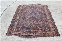 Lot 1206 - Persian rug with two rows of serrated...