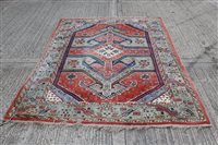 Lot 1207 - Persian Carspet, the salmon-pink ground with...