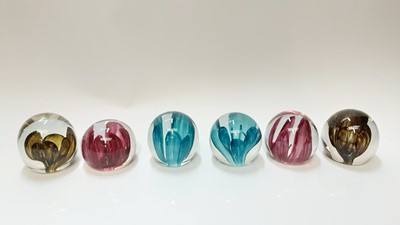 Lot 335 - Six Strathearn Orchid (P.4) art glass paperweights, circa. 1970.