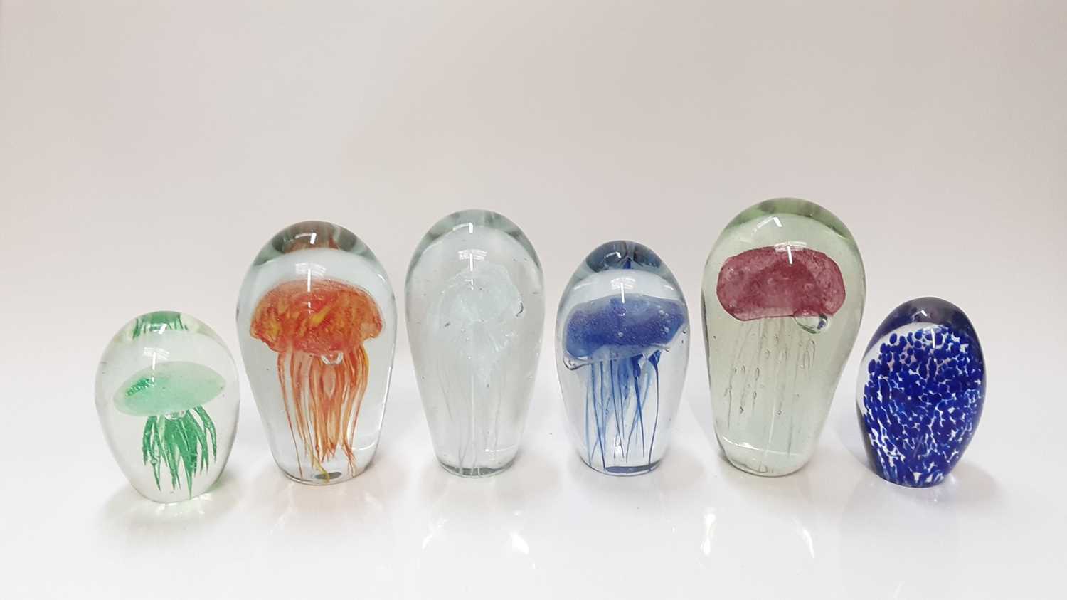 Lot 138 - Six assorted Jellyfish art glass paperweights