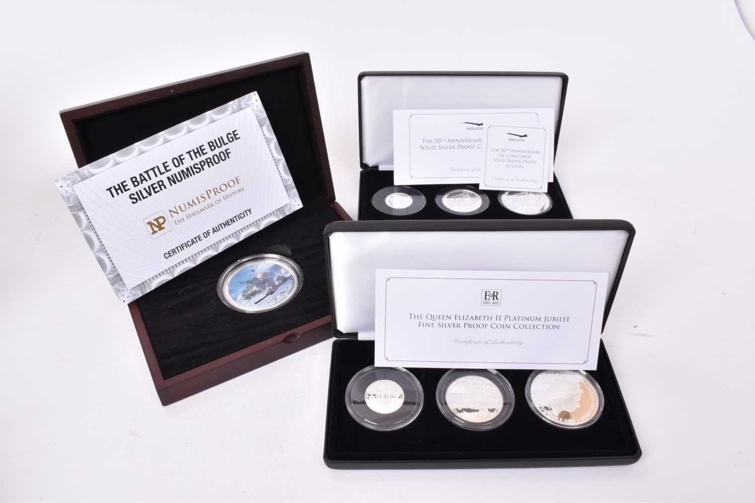 Lot 451 - World - Mixed silver proof set's to include Alderney three coin set 'The 50th Anniversary of Concorde' 2019, Solomon Islands three coin set commemorating 'The Queen Elizabeth II Platinum Jubliee' 2...