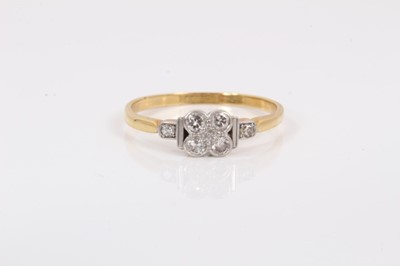 Lot 96 - Edwardian diamond cluster ring with a quatrefoil cluster of old cut diamonds in platinum setting on 18ct yellow gold shank