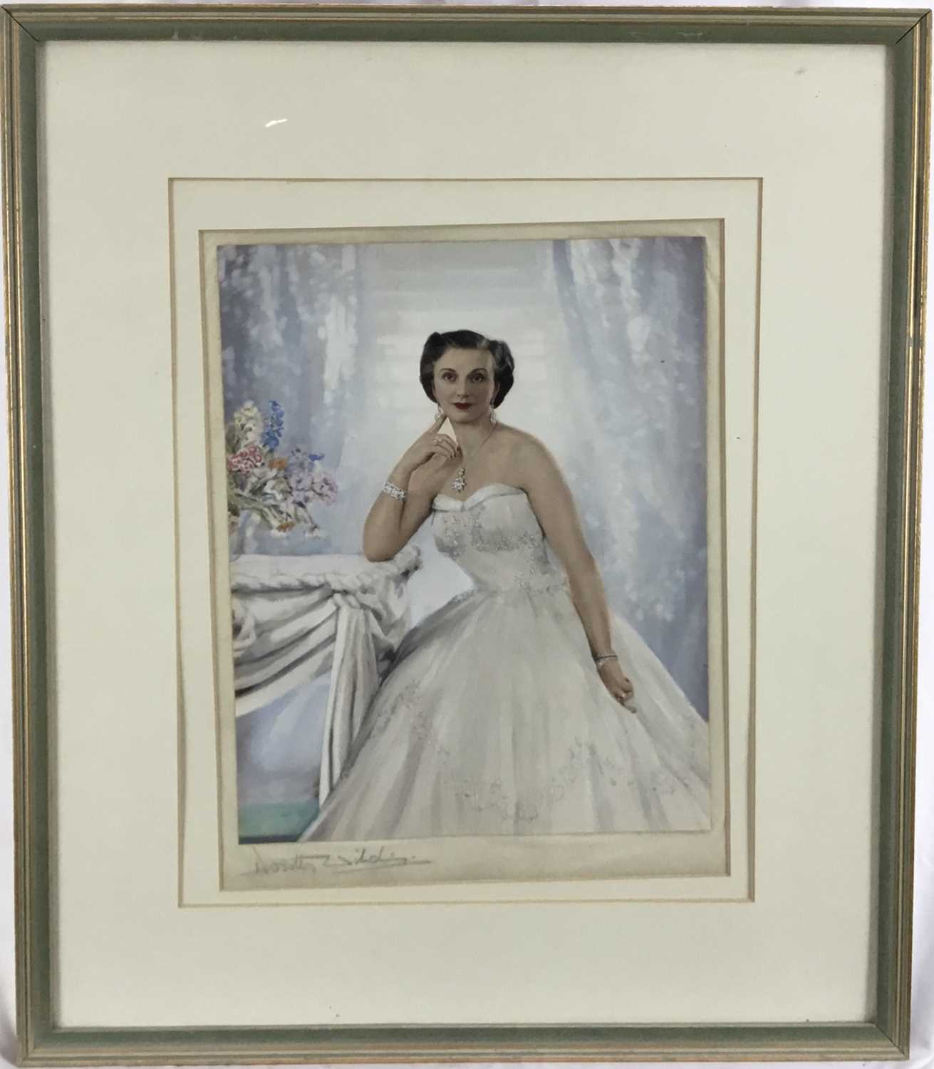 Lot 52 - Dorothy Wilding (1893-1976) hand coloured photograph of a Lady, signed, 30cm x 40cm, mounted in glazed frame, 54cm x 64cm overall