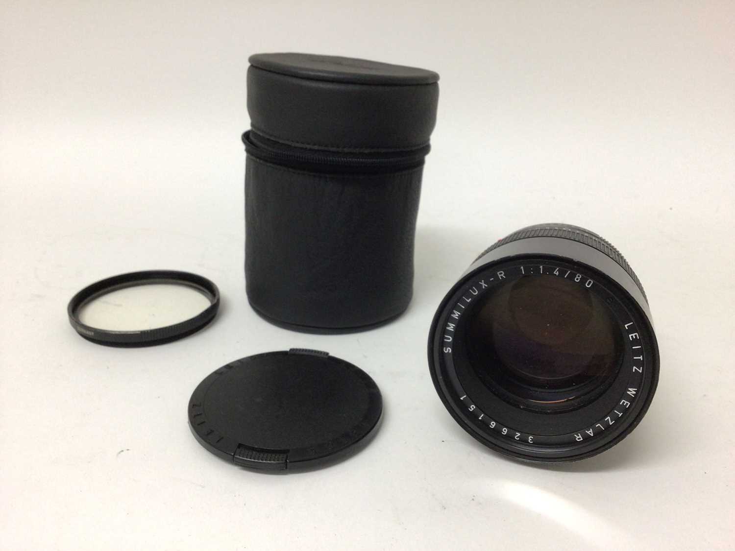 Lot 2356 - Leica Summilux-R f/1.4 80mm lens for Leica R series cameras, with protective filter, lens cap and original leather case