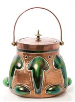 Lot 685 - Art Nouveau iridescent green glass and copper...