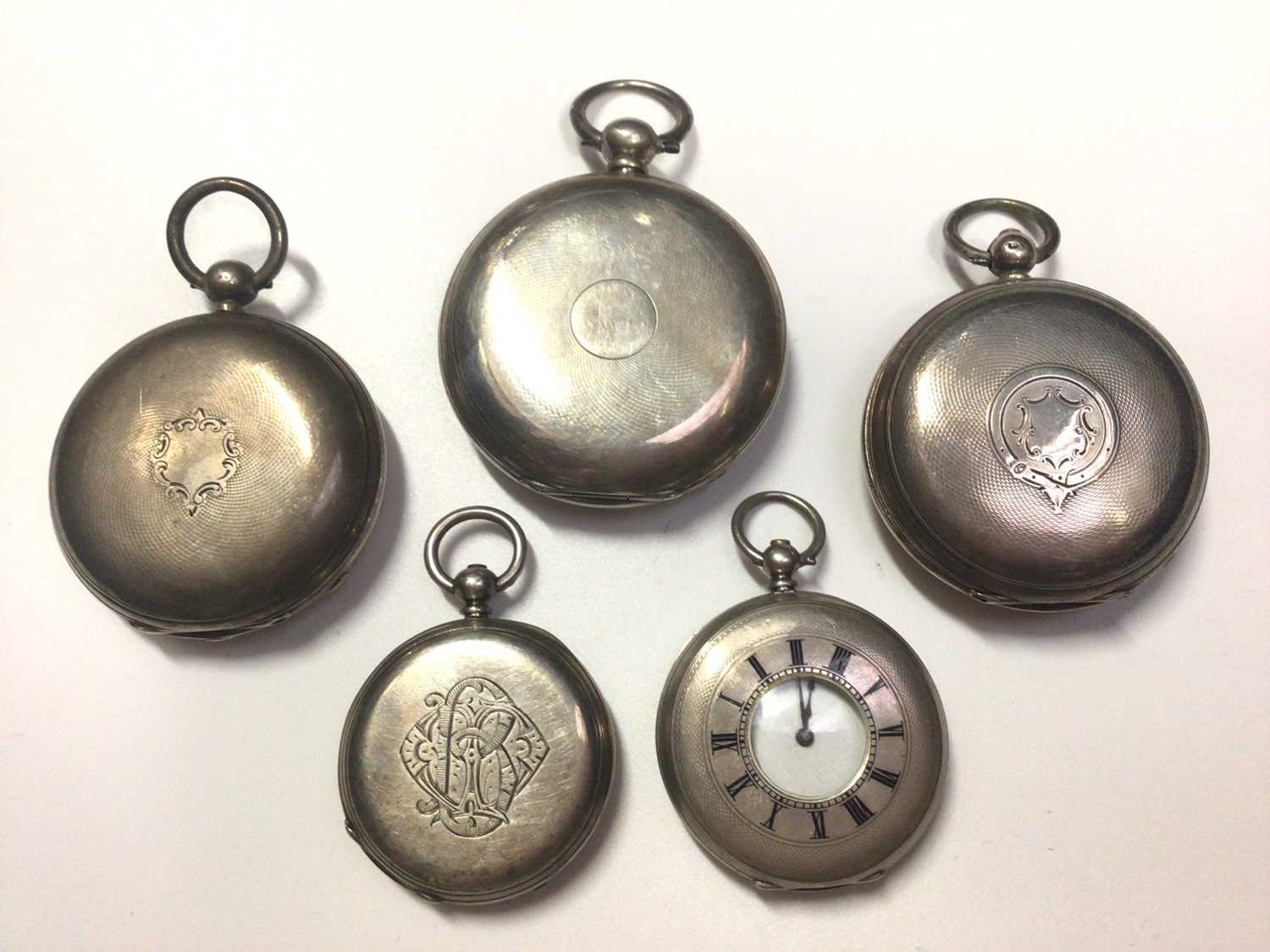 Lot 22 - Five Victorian and later silver cased pocket watches to include four full hunters and one half hunter
