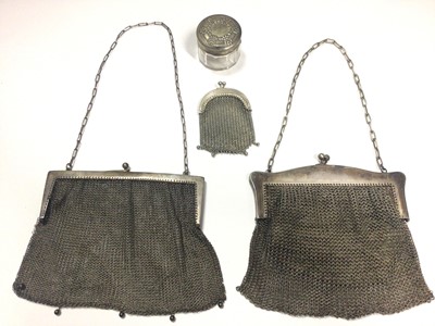 Lot 25 - Silver mesh purse, two other silver plated mesh purses and a vanity jar