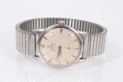 Lot 571 - 1950s gentlemen's Omega Automatic wristwatch with silvered dial, triangular gold coloured hour markers and gold coloured dagger hands in stainless case