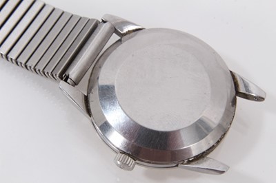 Lot 571 - 1950s gentlemen's Omega Automatic wristwatch with silvered dial, triangular gold coloured hour markers and gold coloured dagger hands in stainless case