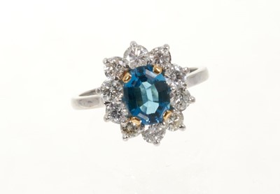 Lot 462 - Diamond and blue topaz cluster ring