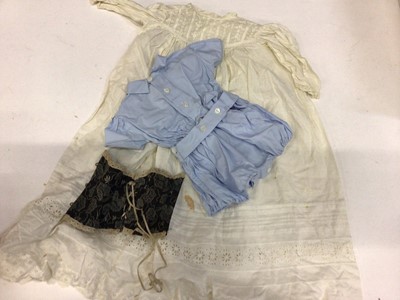 Lot 1846 - Doll's clothing including late 19th century black brocade and lace corset Like Mamma's Doll's Corset with metal stays and fastenings and laced back, white cotton petticoats, white cotton and lace...