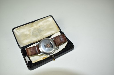 Lot 641 - Unusual Chromium plated wristwatch with engraved Nazi Swastika to cover, the underside engraved with a depiction of a V2 Rocket and the Nazi Eagle. N.B. the engraving possibly later.