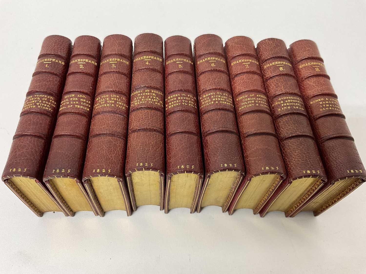 Lot 1726 - William Shakespeare - The Plays, complete set of nine miniature books, approx 85 x 48mm, published London, 1825, in fine full calf bindings