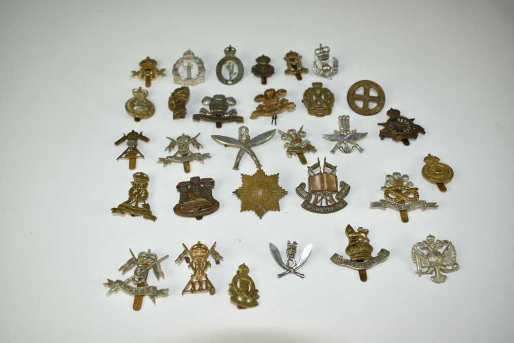 Lot 724 - Collection of thirty military cap badges to
