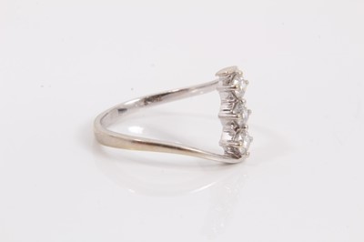 Lot 77 - 18ct white gold diamond three stone ring