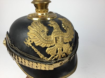 Lot 729 - First World War Imperial German Prussian Officer’s Picklehaube with gilt metal fittings, Prussian eagle plate to front and spike with circular base, brown leather head band and cotton lining to int...