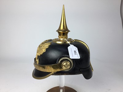 Lot 729 - First World War Imperial German Prussian Officer’s Picklehaube with gilt metal fittings, Prussian eagle plate to front and spike with circular base, brown leather head band and cotton lining to int...