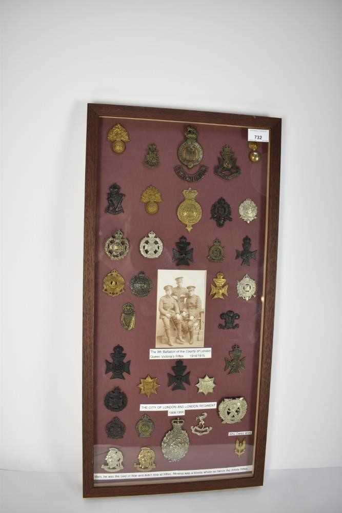 Lot 732 - Collection of Victorian and later cap badges mounted in a glazed frame mainly for Artists Rifles and County of London Queen Victoria's Rifles, (36 badges)