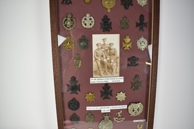 Lot 732 - Collection of Victorian and later cap badges mounted in a glazed frame mainly for Artists Rifles and County of London Queen Victoria's Rifles, (36 badges)