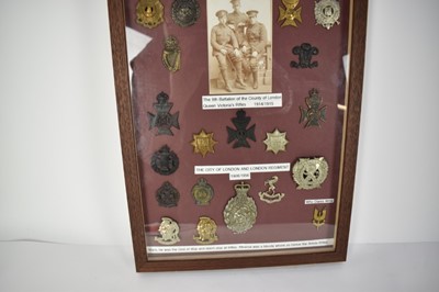 Lot 732 - Collection of Victorian and later cap badges mounted in a glazed frame mainly for Artists Rifles and County of London Queen Victoria's Rifles, (36 badges)